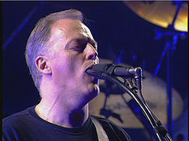 David Gilmour utilisant la Heil Sound Talk Box sur la chanson Pig des Pink Floyd