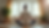 Eye-level view of a caregiver practicing meditation in a quiet room