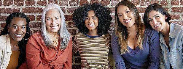 Diverse group of women smiling and networking