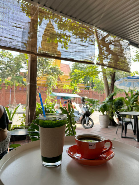 Enjoying coffee at H2O Coffee Cafe in Phnom Penh