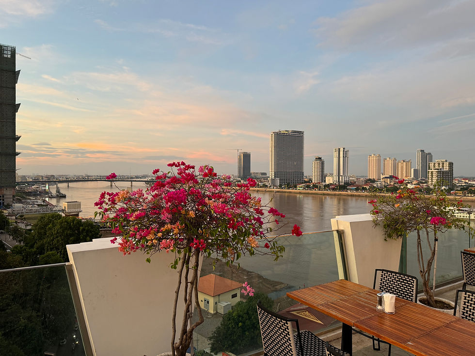 Admiring Tonle Sap River from TRIBE Phnom Penh Post Office Square