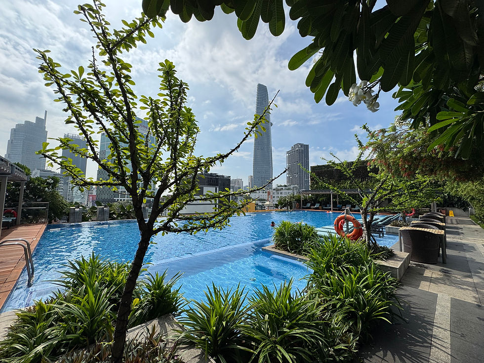 Landscaped rooftop swimming pool at Fusion Original Saigon Centre in Ho Chi Minh City