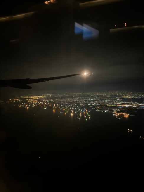 Final approach towards Changi Airport on board Emirates B777