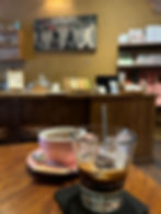 Enjoying our final cup of coffee in Hanoi at Tranquil Books & Coffee