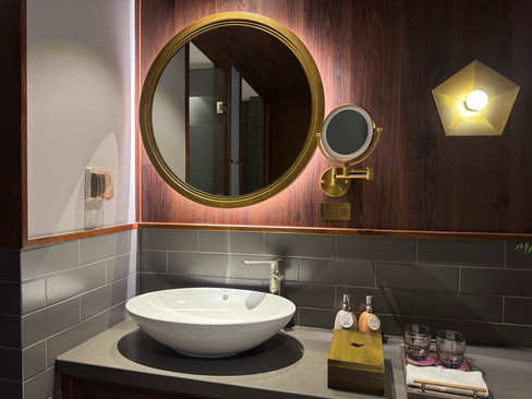 Bathroom vanity with round mirror