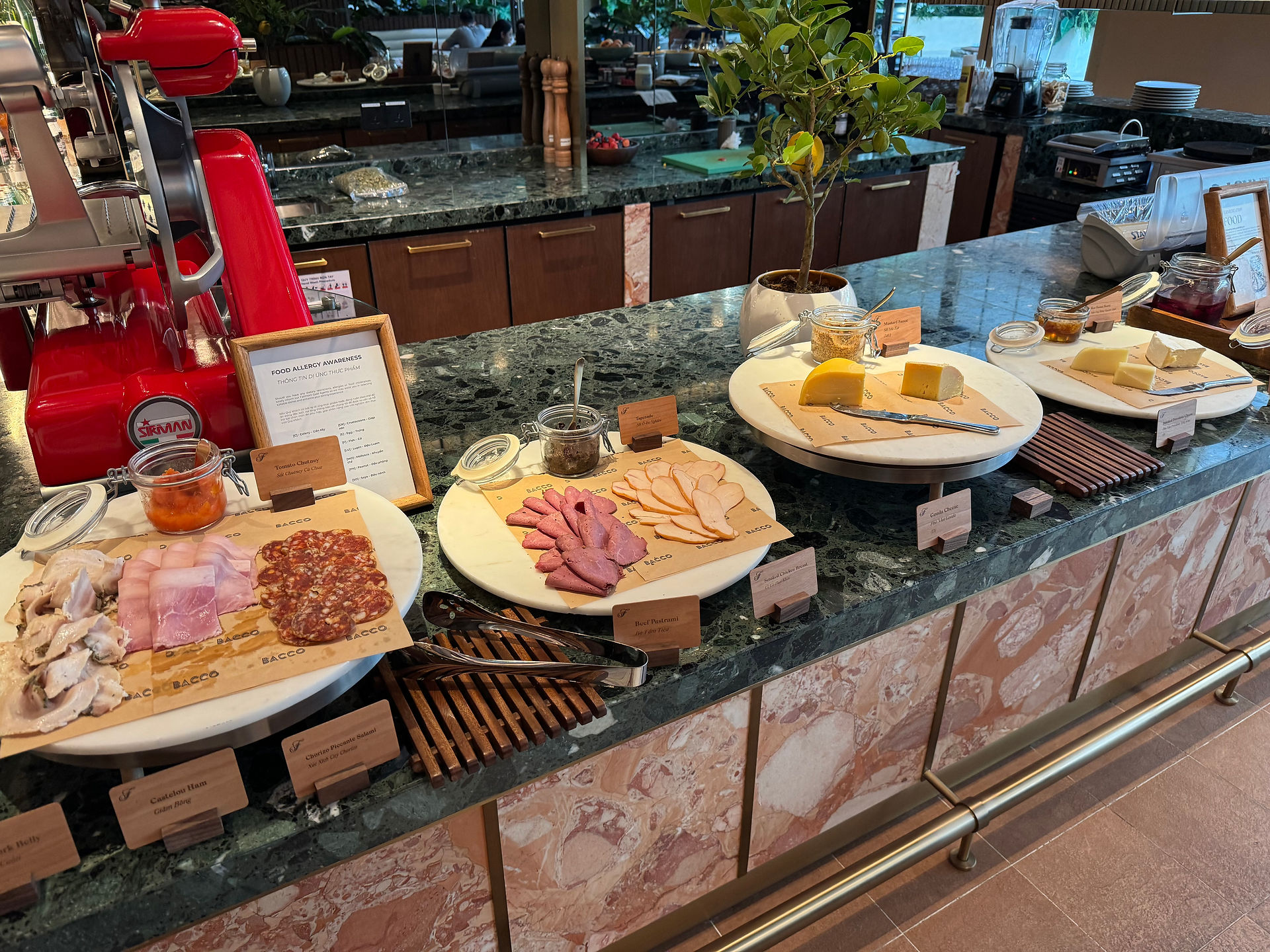 Cold cuts and cheese selection at the Bacco breakfast buffet at Fairmont Hanoi