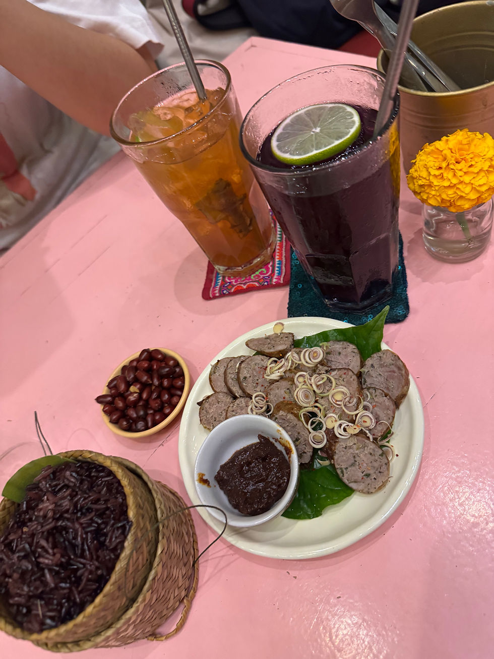 Lao sausage with lemongrass, sticky rice and drinks in Luang Prabang