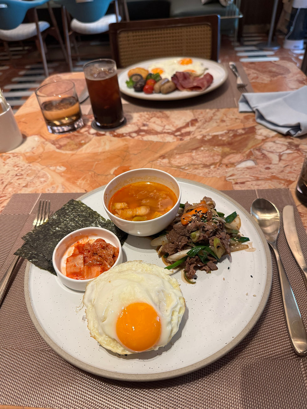 Korean breakfast with fried egg, beef, kimchi and soup at Bacco at Fairmont Hanoi