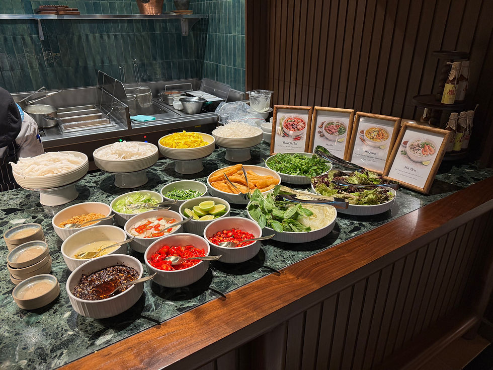 Vietnamese noodle station with pho, bun bo Hue, mi Quang and hu tieu at Fairmont Hanoi breakfast