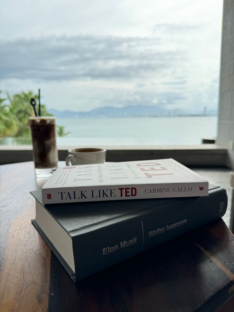 Enjoying a good book with coffee and a fantastic scenery