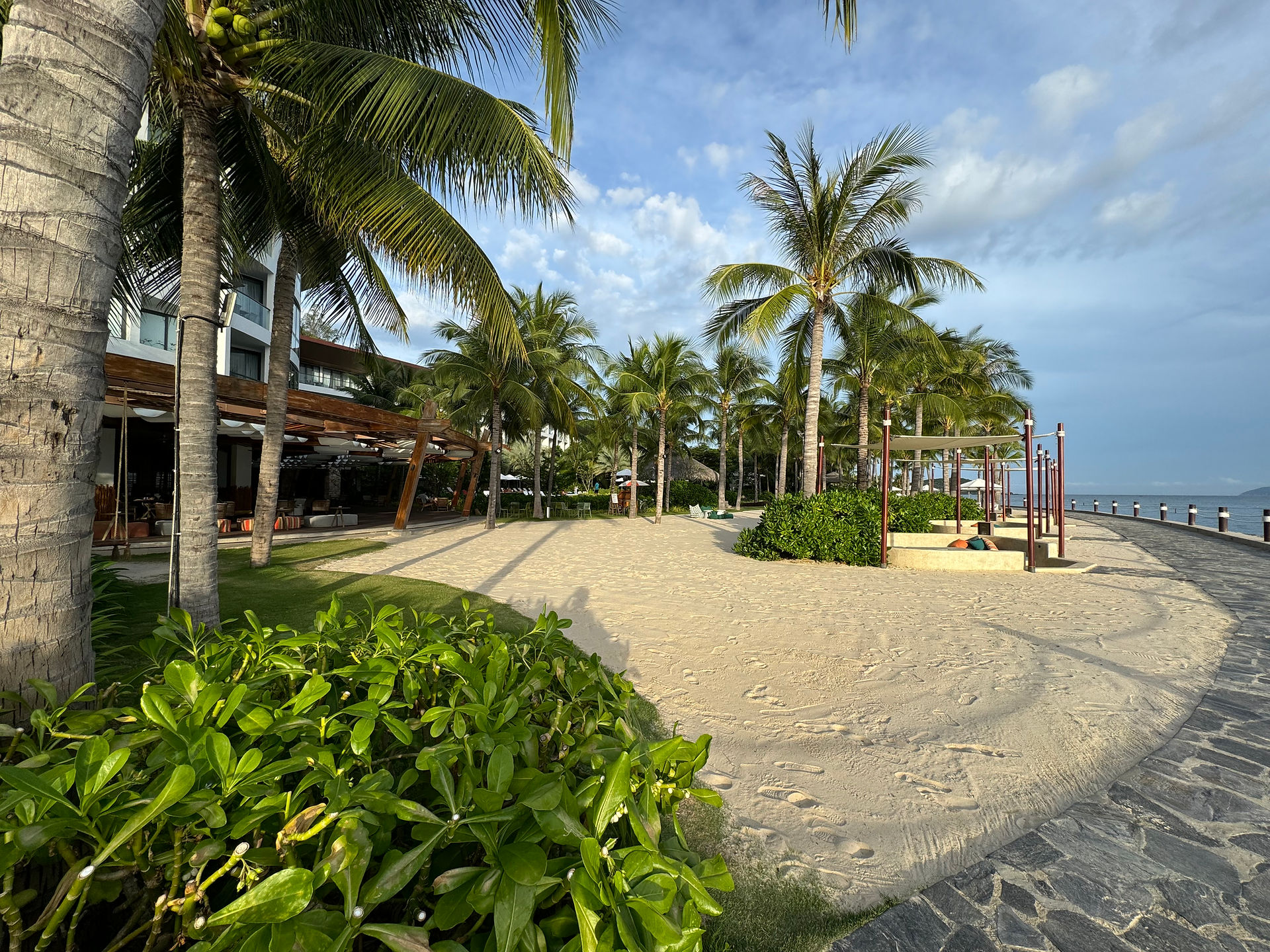 Walking along Boma Resort Nha Trang's beach