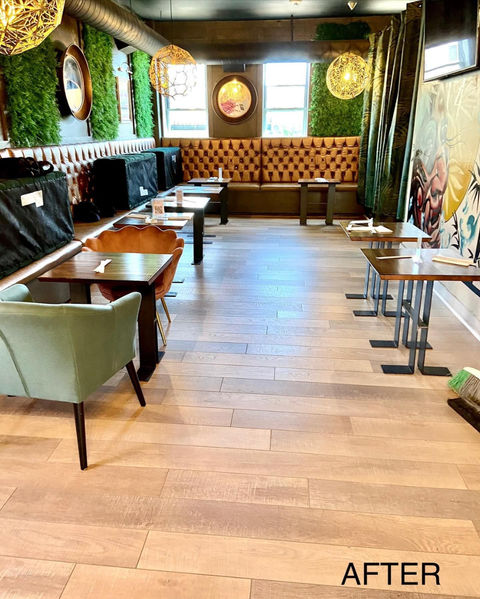 Light beige hardwood flooring installed at former Kitsuen restaurant on H Street, DC, showcasing clean, elegant wood finish in commercial space