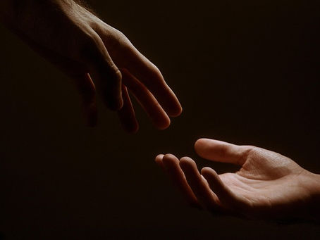 Hands reaching out