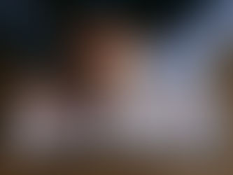 Praying hands over the Bible