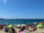 Wide sandy beach and beach clubs in Juan-les-Pins