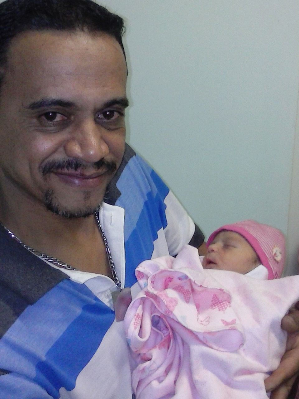 Paulo com sua netinha.