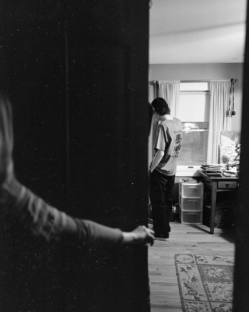 Untitled, (Wyatt in the Door Frame), 2018 photograph by Megan Reilly
