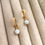 Thumbnail: Aquamarine Huggie Hoops