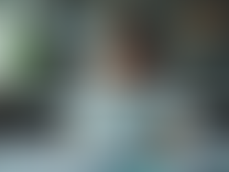 A stressed employee overwhelmed by work, highlighting team burnout risks