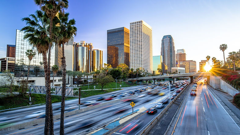 los-angeles-downtown-buildings-skyline-highway-traffic-premium-wallpaper.jpg