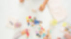 step-by-step-little-girls-painting-paper-mache-unicorn-with-acrylic-paint.jpg