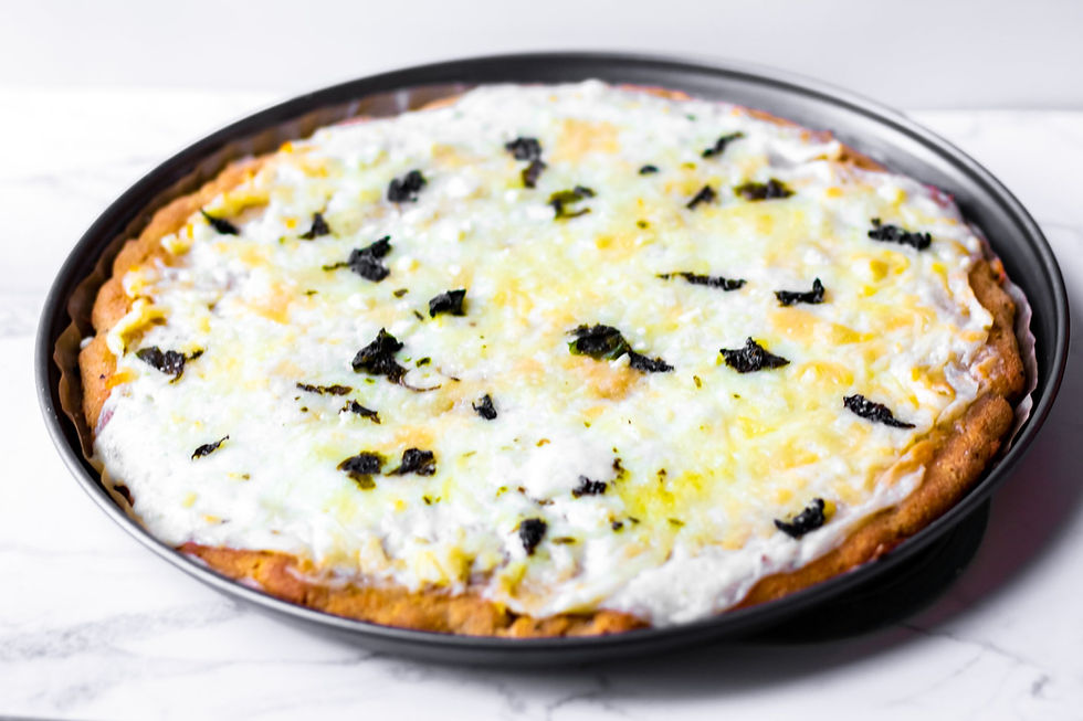 Ketogenic pizza recipe with keto ingredients by Keto and co