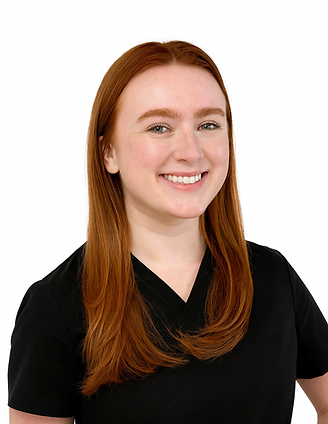 Smiling Professional in Scrubs.png