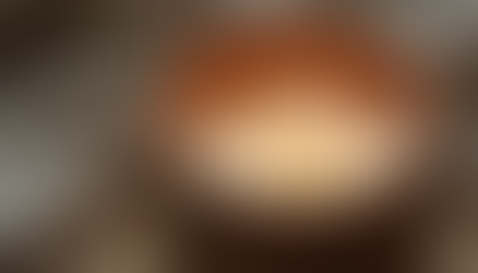 A soy wax candle burning