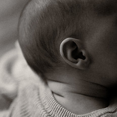 A close view of a newborn's ear.