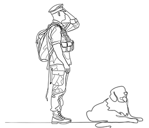 A soldier stands with his service dog