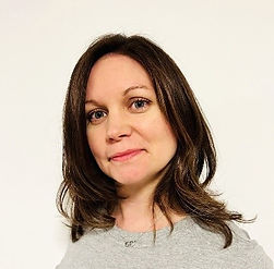 Jenny Weidner has long brown hair and brown eyes
