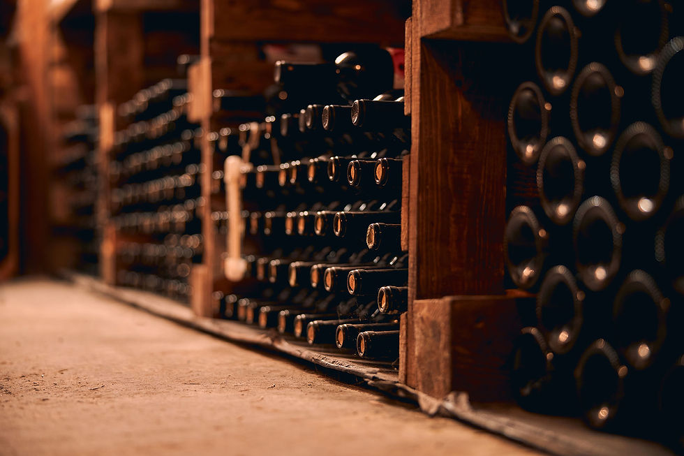 storage-room-with-glass-bottles-alcoholic-drink-wooden-racks.jpg