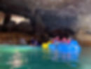 A line of cave tubers float through Jaguar Paw Cave in Belize