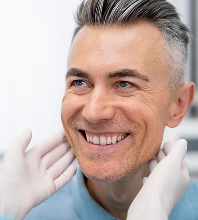 Man at dentist smiling