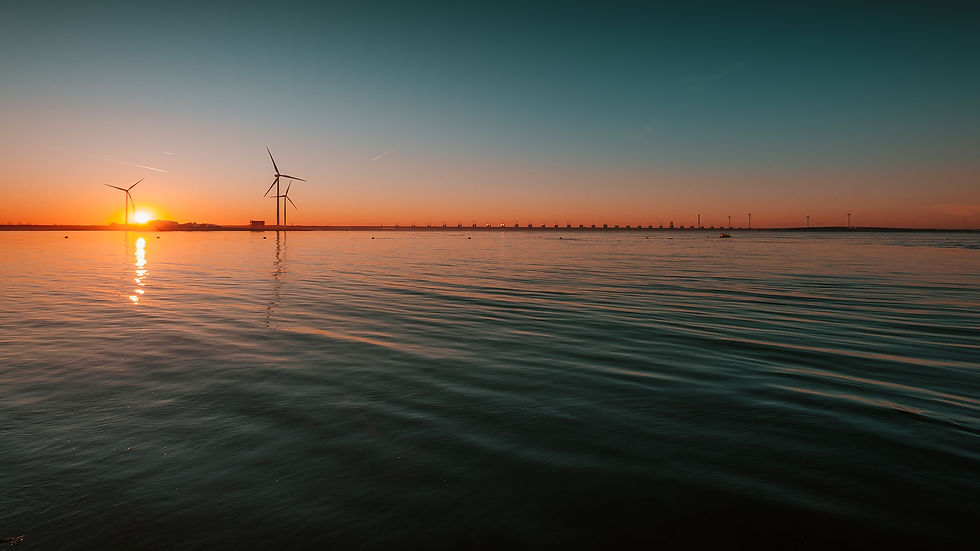 beautiful-view-calm-ocean-with-turbines-mesmerizing-sunset.jpg