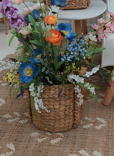 Woven basket of colorful fresh flowers