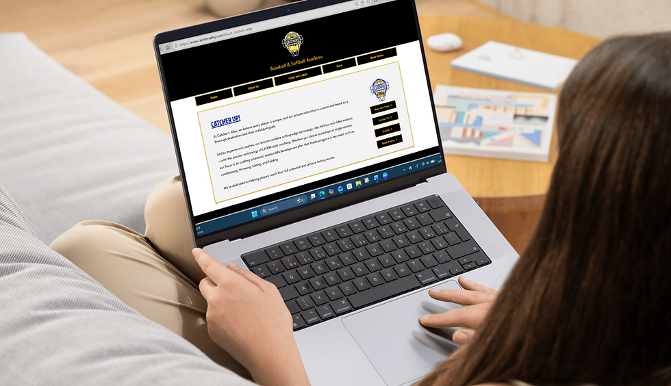 Woman using a laptop on a sofa to view Catcher's Alley website.