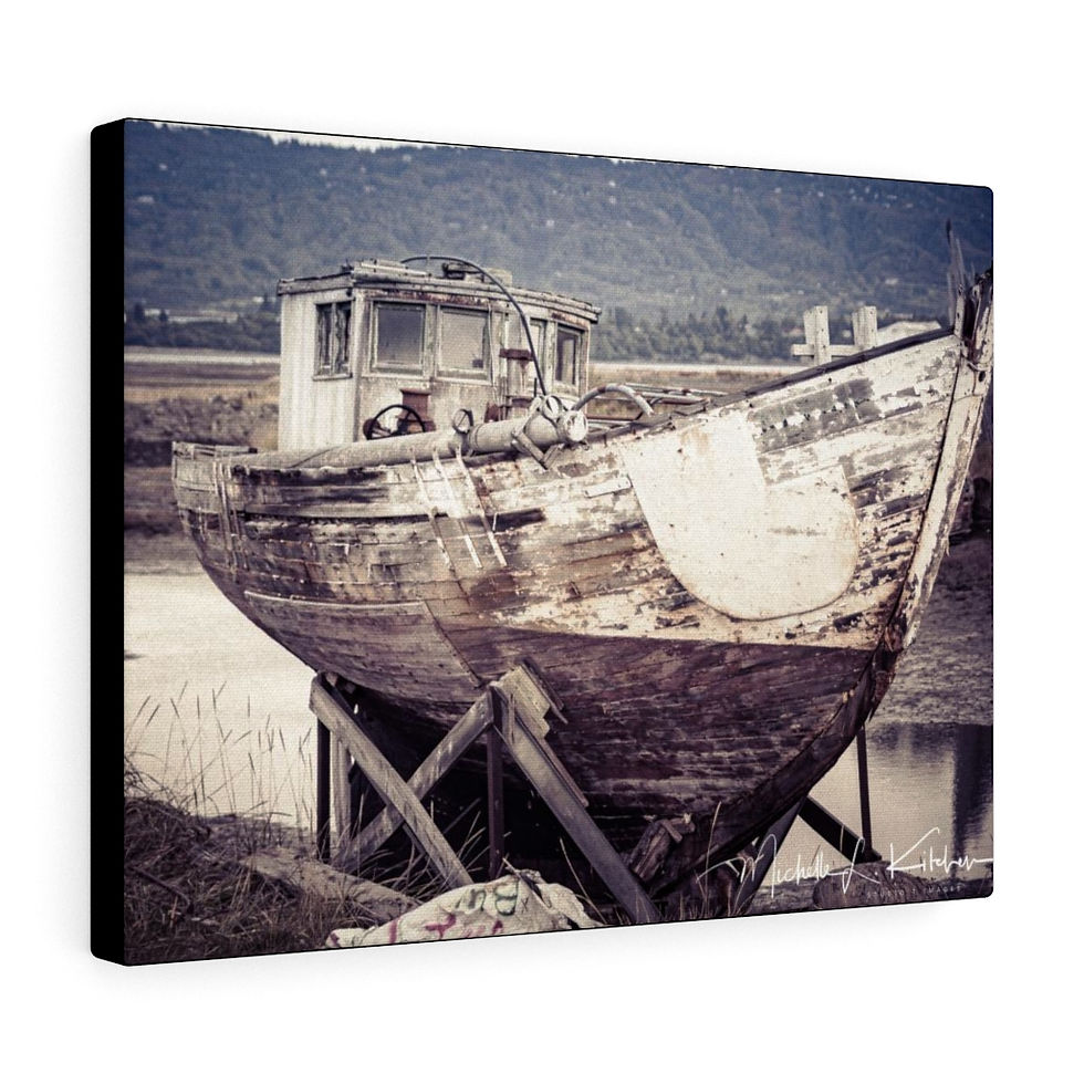 Thumbnail: Old wooden boat on a stand, hills in background