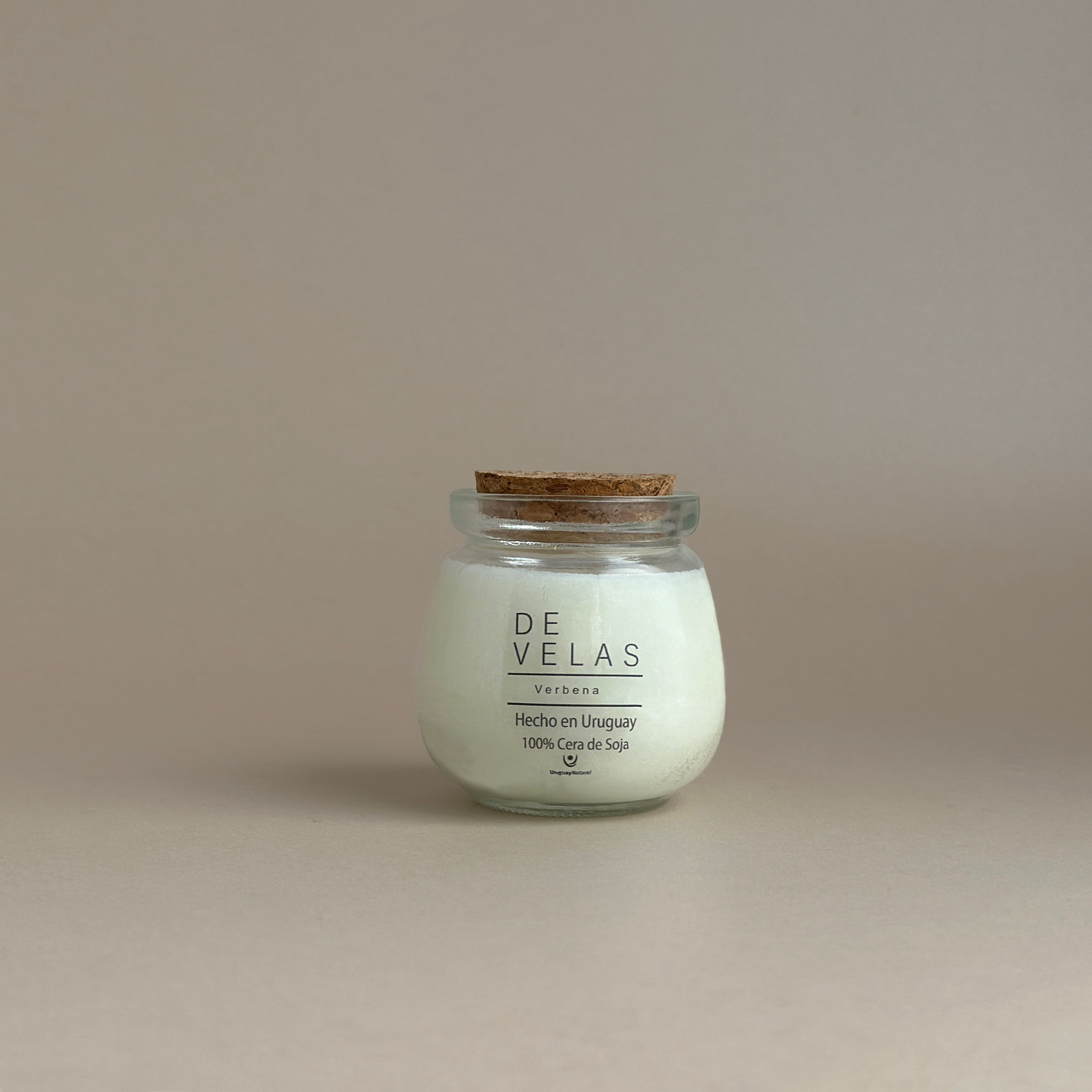 Vela de soja natural en vaso de vidrio transparente con tapa de corcho