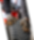 Mechaniker mit Arbeitshandschuhen hält einen Autoreifen mit ausgeprägtem Profil in einer Werkstatt.png
