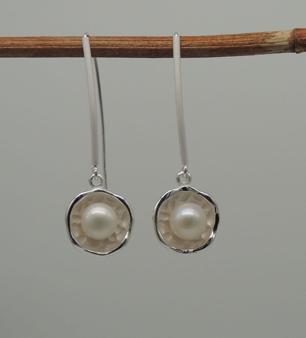 Thumbnail: Long stem silver and pearl earring