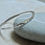 Thumbnail: Beaten Finish Asymmetrical Solid Silver Bangle