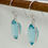 Thumbnail: Delicate Blue Topaz Cut Stone Oval Earring