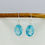 Thumbnail: Delicate Blue Topaz Cut Stone Oval Earring
