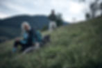 hikers eating a snack and taking a break in tasmania