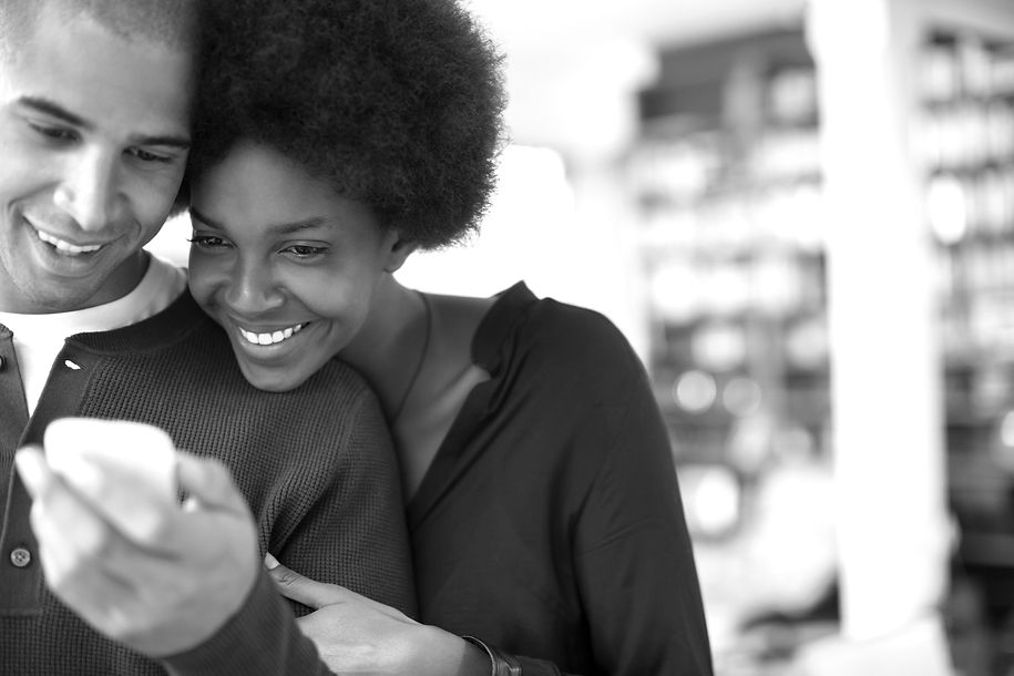 A couple looking at a cellphone