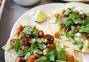 Roasted Chickpea and Mushroom Tacos with Jalapeño Lime Slaw