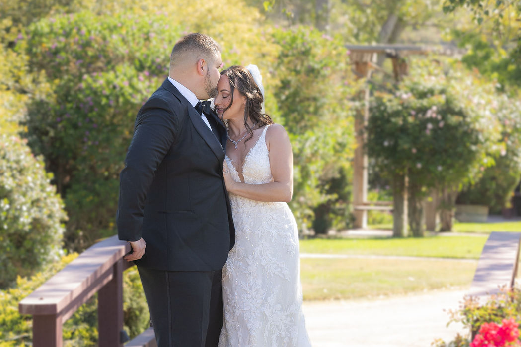 Couple embracing on historic Varian Equestrian Ranch