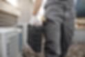 repairman-with-toolbox-working-on-air-conditioning-2026-03-17-03-33-16-utc(1).jpg