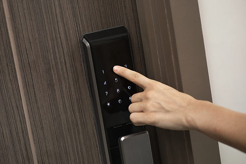 hand-and-digital-smart-code-lock-into-the-modern-a-2026-03-09-23-14-13-utc(1).jpg